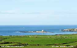 The tidal isley of Cribinau with St. Cwyfan's Church.