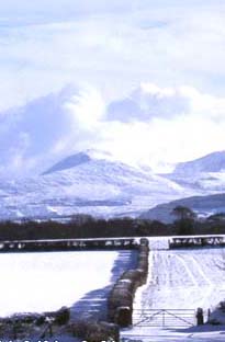 Snow in Llansadwrn and Snowdonia on 26 February 2004.