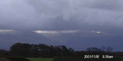The first lying snow on the mountains seen at 9.36am on 8 November 2001.