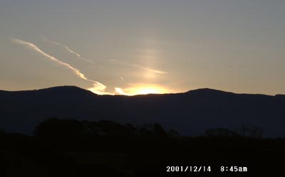Sun pillar photographed  at 0845 GMTon 14 December 2001. © D Perkins.