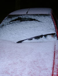 Snow pellets covering my car on 25 December 2001