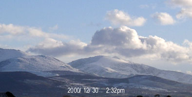 Clear view of snow covering Crib Goch and Snowdon at 1333 GMT on 30 December 2001. 