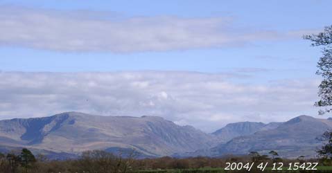 A clear view across to the Carneddau Mountains on the afternoon of 12 April 2004.Digital Photograph © Donald Perkins
