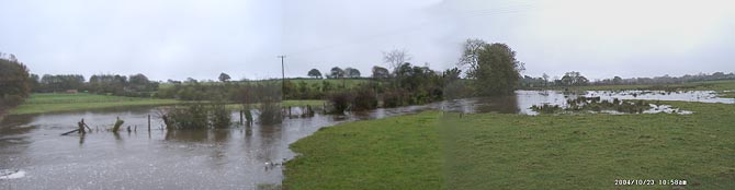 Flooding at Pont y Crug where the Afon Braint burst it banks following torrential rain at it's source in Llansadwrn. 