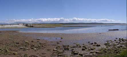 Stratocumulus clouds over Llyn on 25 June 2004. View across the Cefni Estuary at Malltraeth Cob. Click to see larger image. 