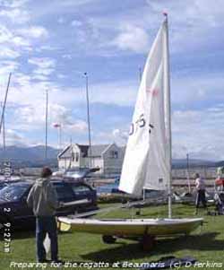 Preparing a Laser class boat for the regatta at Beaumaris. Click for larger.