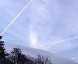 Frontal cloud clearing to cirrus and contrails at 06 GMT on 4 April 2005. Click for larger. 