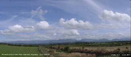 Dispersing clouds over Snowdonia. Click for larger. 
