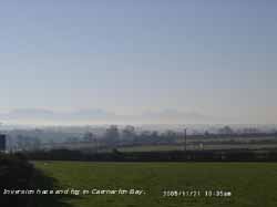Inversion in Caernarfon Bay with the mountains of Lleyn in the clear. Click for larger. 