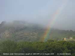 Rainbow seen under Penmaenmawr at 1845 GMT on 11 August 2005. Courtesy of Gordon Perkins. 