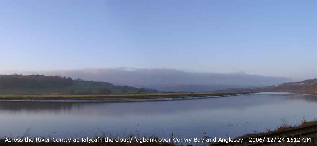 Across the River Conwy the cloud/ fogbank over Conwy Bay and Anglesey.