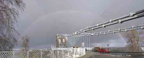 Rainbow over Pont Menai Suspension Bridge on 6 Dec 2006.