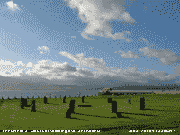 View of cumulus over Snowdonia across the straits at Beaumaris Gorsedd Circle.