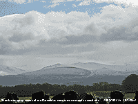 Lifting cloud revels snowfall on lower slopes of Carneddau.