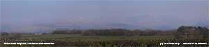 Dense haze mostly obscured the Snowdonia Mountains in the afternoon.