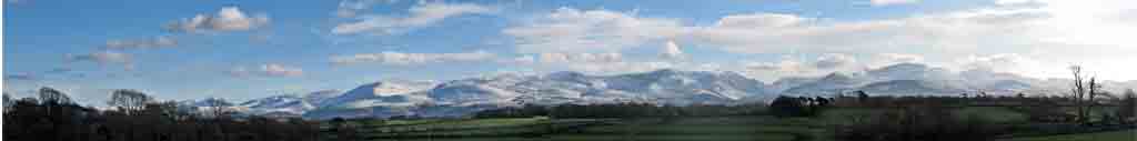 Snowdonia Mountains with snow viewed form Llansadwrn..