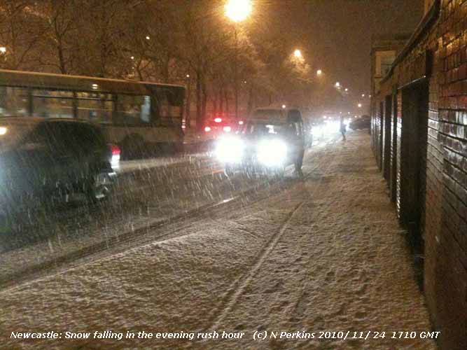 Snow falling in Newcastle during the evening rush hour.