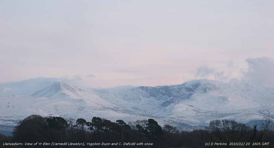 The cliffs of the Black Ladders outlined in the snow.