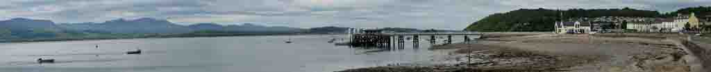 Menai Strait and Pier at Beaumaris on a cloudy morning.
