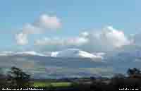 Snow capped Carnedd Llewelyn.