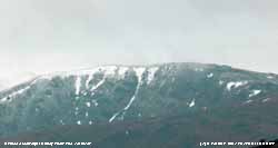 C. Llewelyn with snow gullies and old cornices.