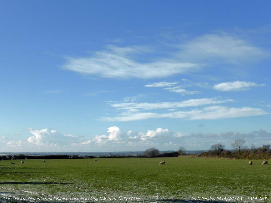 Distant cumulonimbus clouds observed over the Irish Sea to the N.