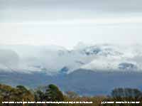 Fresh snowfall on the mountains in the afternoon.