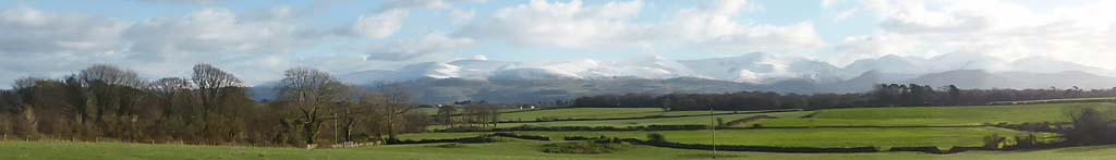 A fine afternoon with mostly fair weather cumulus clouds.