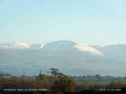 Snow on Carnedd Llewelyn in hazy November sunshine.