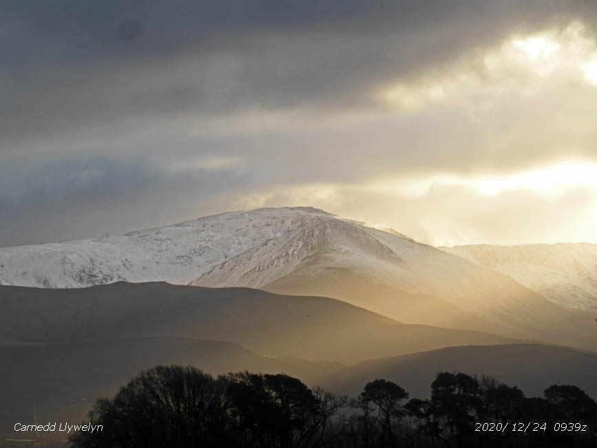Fresh snow had fallen on the Carneddau and Snowdon.