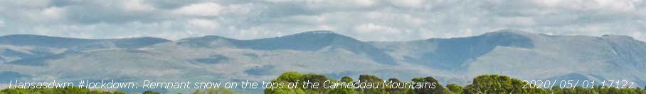 View of the Carneddau Mountains, Wales in #lockdown revealing a little snow.
